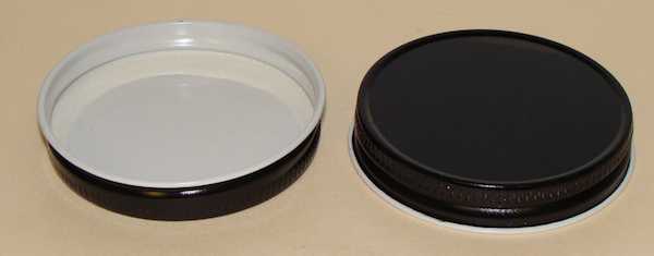 58-400 NATURAL THREADS, KNURLS, & CURL TIN-PLATE STEEL TIN-PLATE STEEL CONTINUOUS THREAD (CT) CAP WITH PLASTISOL LINER