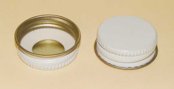 28-400 WHITE THREADS, KNURLS, & CURL TIN-PLATE STEEL TIN-PLATE STEEL CONTINUOUS THREAD (CT) CAP WITH PLASTISOL LINER