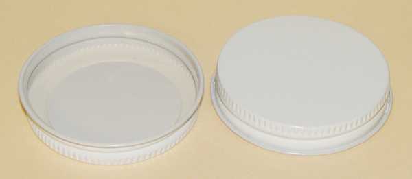 53-400 NATURAL THREADS, KNURLS, & CURL TIN-PLATE STEEL TIN-PLATE STEEL CONTINUOUS THREAD (CT) CAP WITH PLASTISOL LINER