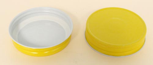 70MM YELLOW/WHITE THREADS, KNURLS, & CURL TIN-PLATE STEEL METAL CONTINUOUS THREAD (CT) CAP WITH PLASTISOL LINER