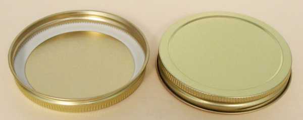 89-400 GOLD/GOLD THREADS, KNURLS, & CURL TIN-PLATE STEEL METAL CONTINUOUS THREAD (CT) CAP WITH PLASTISOL LINER