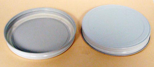 100-400 THREADS, KNURLS, & CURL TIN-PLATE STEEL METAL CONTINUOUS THREAD (CT) CAP WITH PLASTISOL LINER
